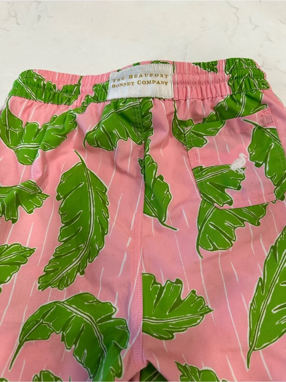 The Beaufort Bonnet Company Pink Swim trunks with Green Palm Print